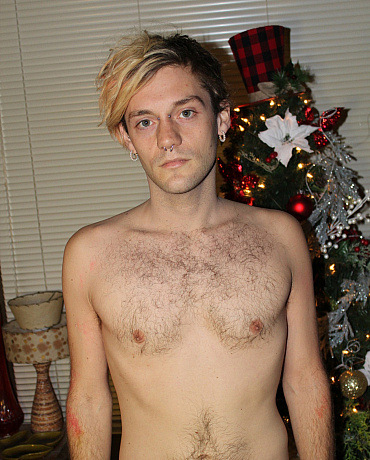 A Christmas Twink Unwraps His Package Under the Tree